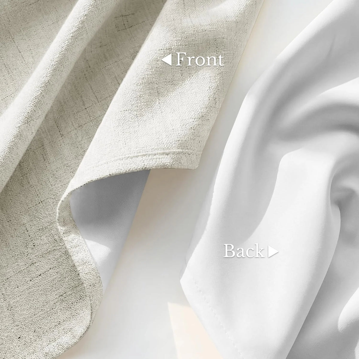 Ivory textured curtain fabric with smooth white blackout backing shown close up