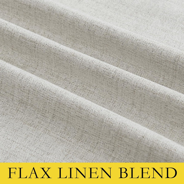 Close-up view of light beige flax linen blend fabric with a visible woven texture and soft, natural drapes.