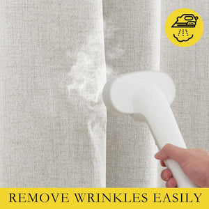Handheld steamer applies steam to light beige linen-blend curtain, demonstrating easy wrinkle removal.