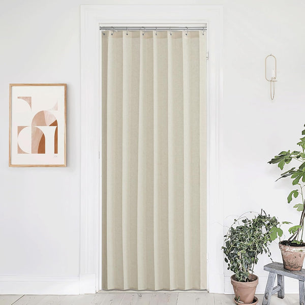 Natural light beige textured linen panel curtain on silver rod for doorway privacy.