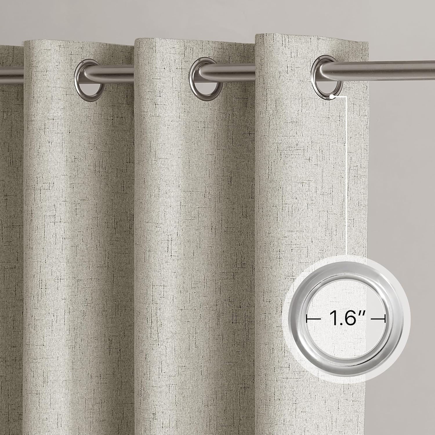 Light beige linen-textured grommet top curtains with silver rings on a rod, showing 1.6 inch inner diameter.