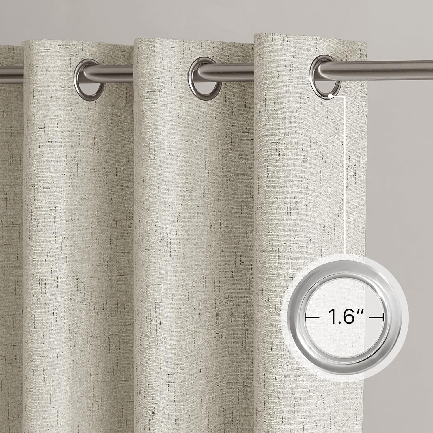 Close-up of light beige textured linen grommet curtains on rod, highlighting 1.6 inch inner diameter.