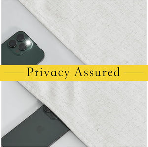 Light beige textured linen curtain fabric demonstrating privacy, with a smartphone flash obscured underneath.