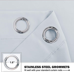 Close-up of light blue curtain fabric showing two prominent 1.6-inch stainless steel grommets.