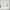 Light blue door window treatments on white French door. Includes a flat panel and a tied balloon shade.