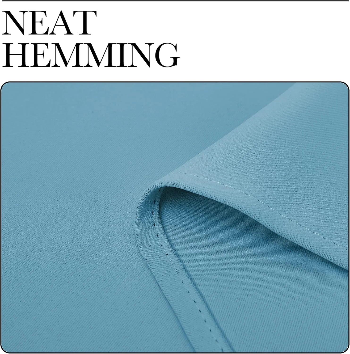 Close-up of light blue fabric with neatly stitched hem and folded edge