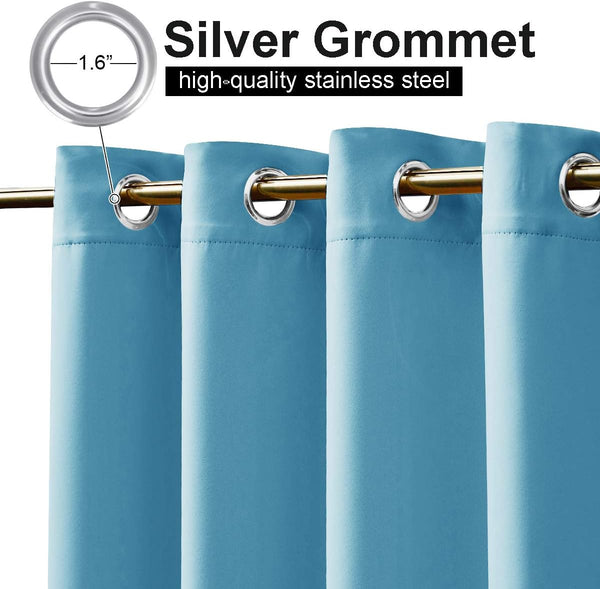 Light blue curtains with silver stainless steel grommet tops, 1.6 inch diameter, hanging on a golden curtain rod.