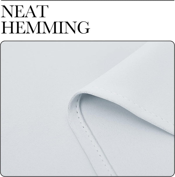 Close-up of light gray fabric showing neat, uniform hemming with visible, precise stitching.