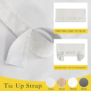 Light gray linen tie-up Roman window shade with hook-and-loop strap, styled rolled up and gathered with bowknots.