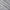 Detailed view of light gray textured wallpaper with shimmering metallic silver wavy and straight lines pattern.