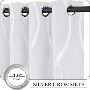 Light gray curtains with a white wavy line pattern and silver 1.6-inch grommets on a dark rod.