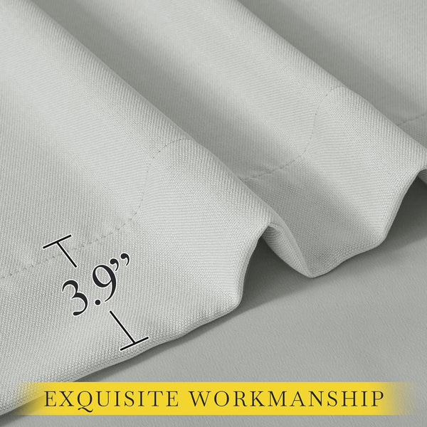 Close-up of light grey textured curtain fabric with a 3.9-inch stitched hem, showcasing quality craftsmanship.