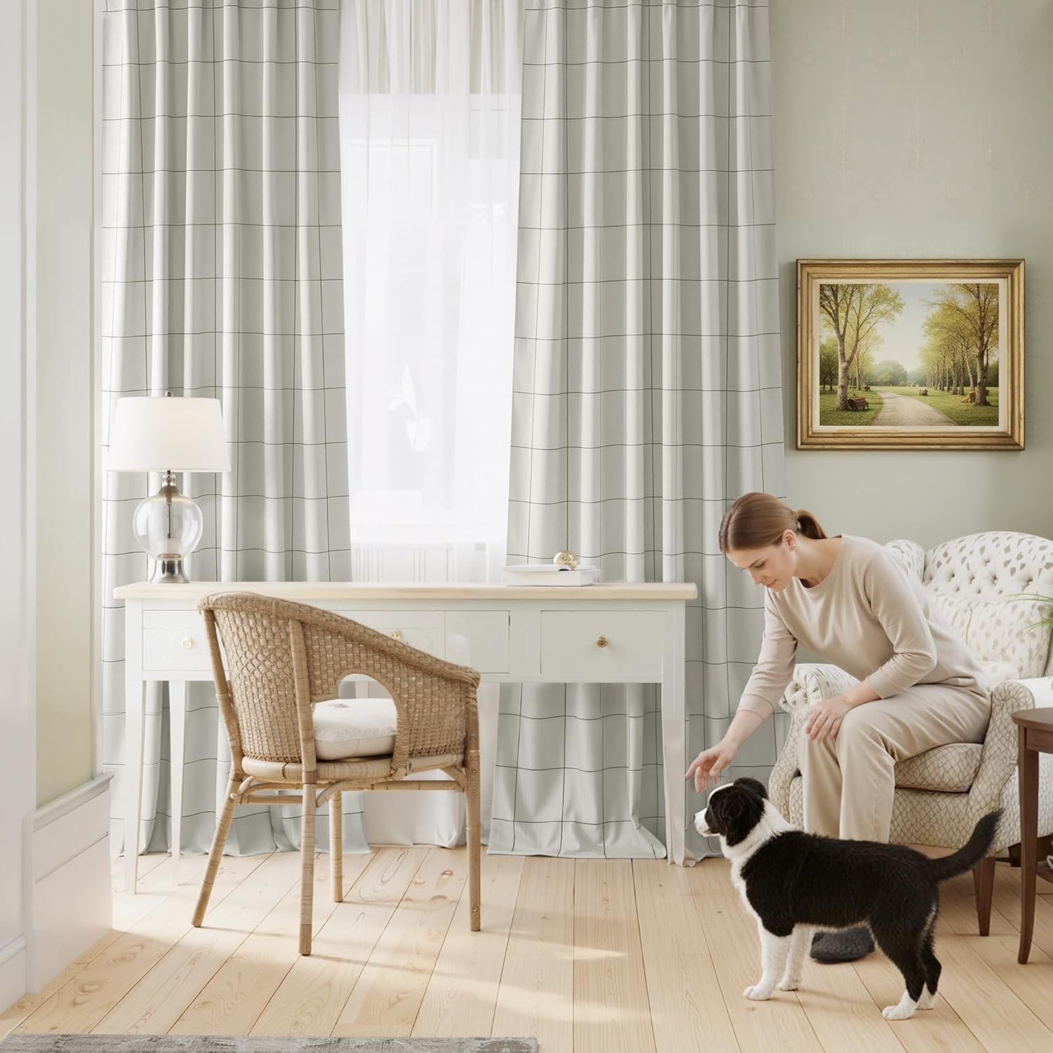 Light grey fabric curtains with a fine black grid pattern hanging in a bright home office setting.