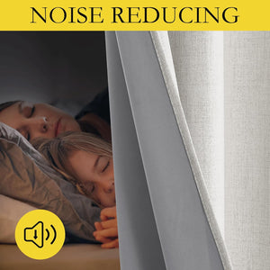 Close-up of a light grey linen-look noise-reducing curtain with a thick backing, promoting peaceful sleep.