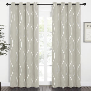 Two light grey curtain panels featuring a modern silver wave pattern and black grommet tops.