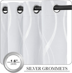 Light grey curtains with subtle wavy white lines and prominent silver grommets on top.