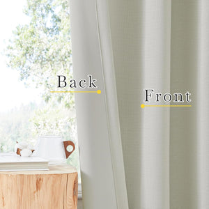 Light grey woven textured room darkening curtains hanging, showing the distinct front and back.