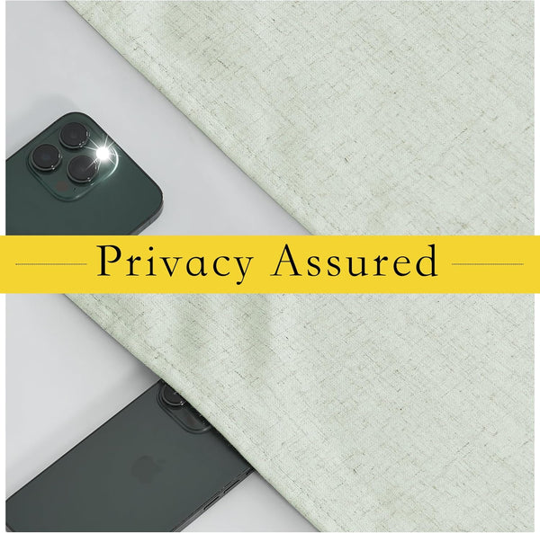 Light linen-textured fabric covering smartphones, one with a bright flash, demonstrating assured privacy and blackout.