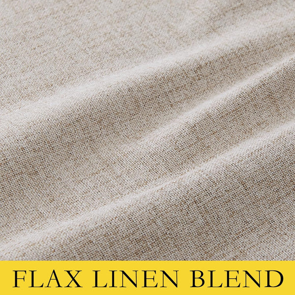Close-up of a light oatmeal flax linen blend fabric with visible woven texture and soft folds.
