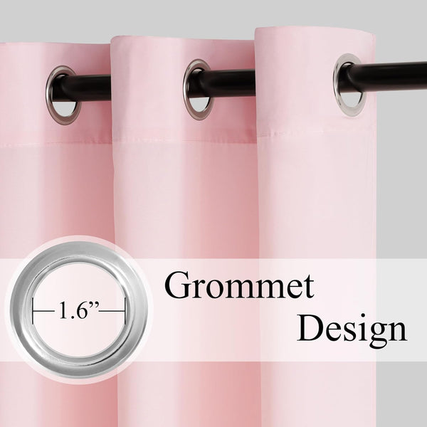 Close-up of light pink fabric curtains with 1.6-inch silver grommets hanging on a black rod.