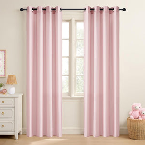 Pair of light pink solid curtains with black grommet tops in a child's room.