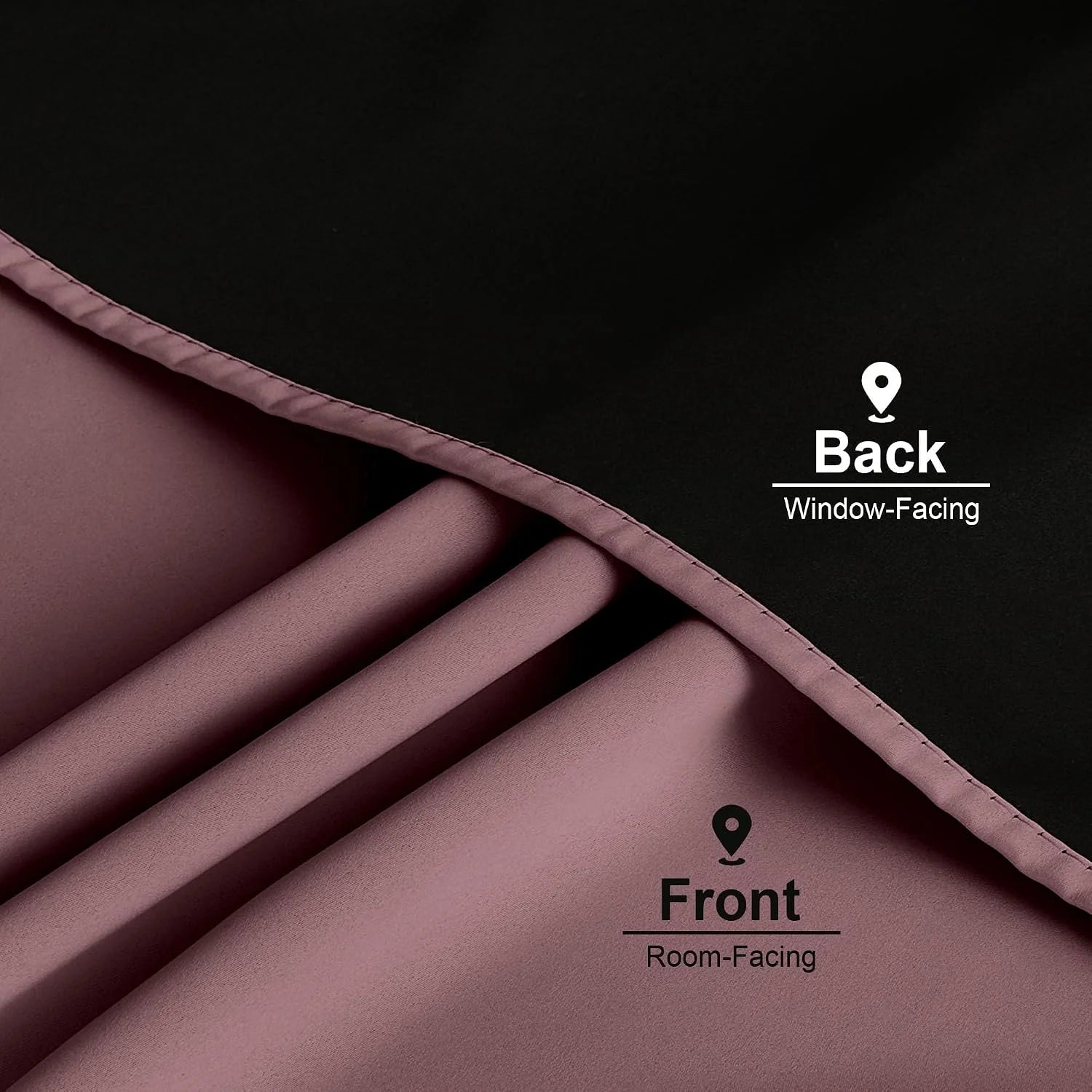 Close-up of mauve blackout curtain fabric showing pink front and black back layers