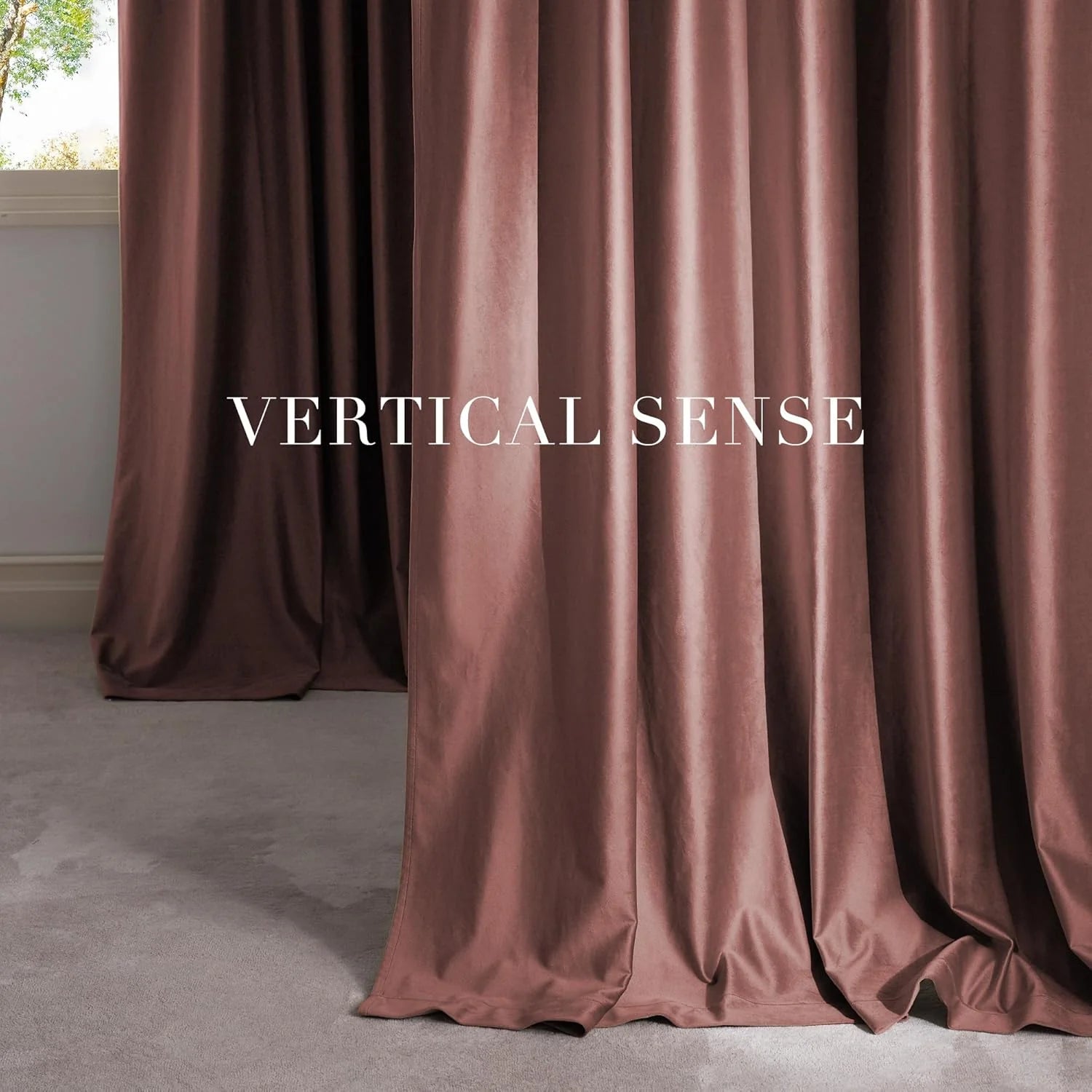 Mauve satin drapes pooling on the floor beside a bright modern window