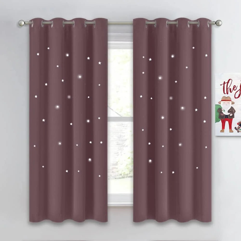 Mauve grommet-top curtains with glowing star cutout pattern over a window