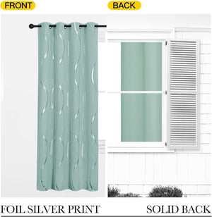 Mint green curtain panel with silver foil wavy print and grommet top, showing a solid light-blocking back.