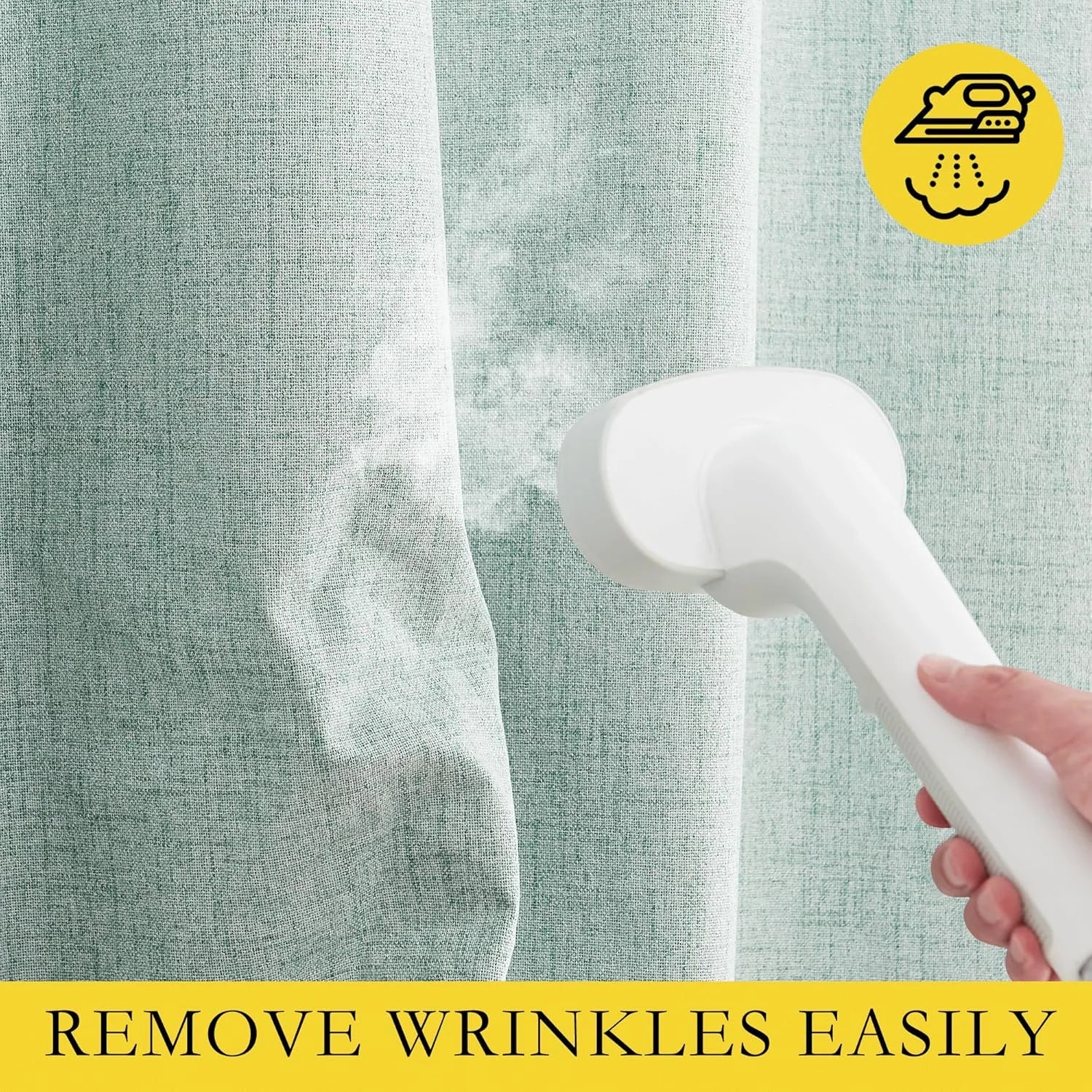Hand steams wrinkles from a mint sheer linen curtain with a white garment steamer