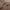 Detailed view of mocha brown curtain fabric, highlighting neat double-stitched hem and fine weave.