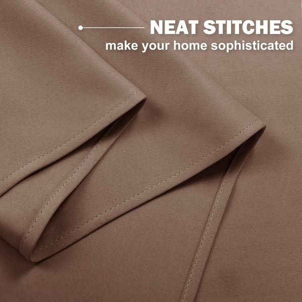 Detailed view of mocha brown curtain fabric, highlighting neat double-stitched hem and fine weave.