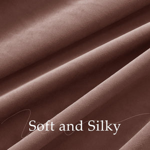Close-up of luxurious mocha brown velvet fabric with a soft, silky texture and elegant folds.
