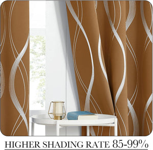 Mocha blackout curtains with silver wavy geometric lines, hung by a window with a side table.