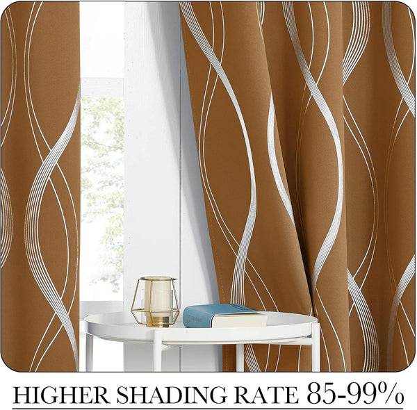 Mocha blackout curtains with silver wavy geometric lines, hung by a window with a side table.
