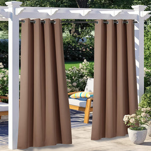 Mocha outdoor grommet curtains hanging from a white pergola, providing shade and privacy for a patio.