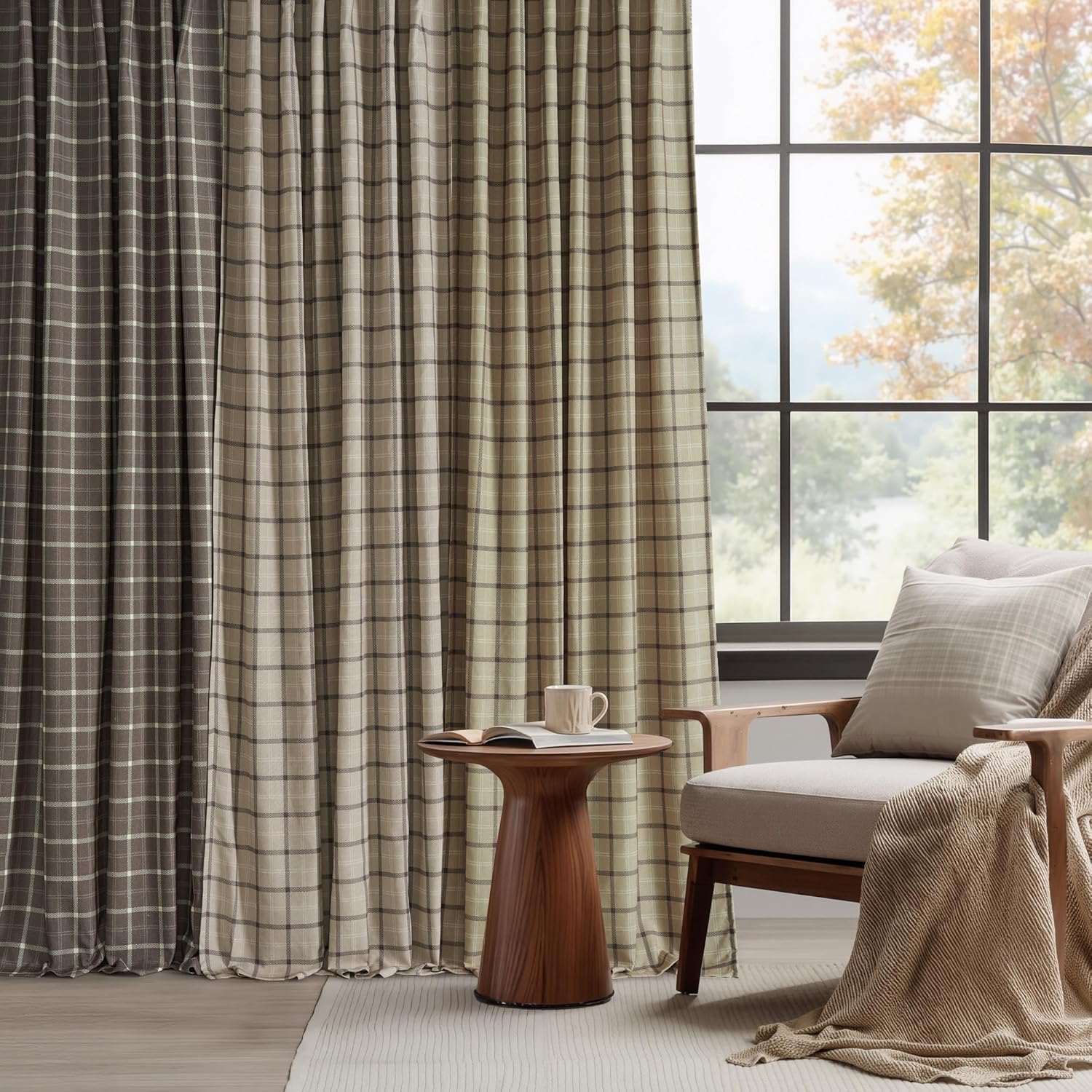 Brown and beige plaid pinch pleat curtains hang by a window in a cozy living room.
