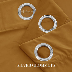 Close-up of mustard brown blackout curtain fabric with three shiny silver grommets, showing a 1.6 inch inner diameter.