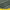 Close-up of folded muted green fabric showing its smooth, soft, and slightly textured surface.