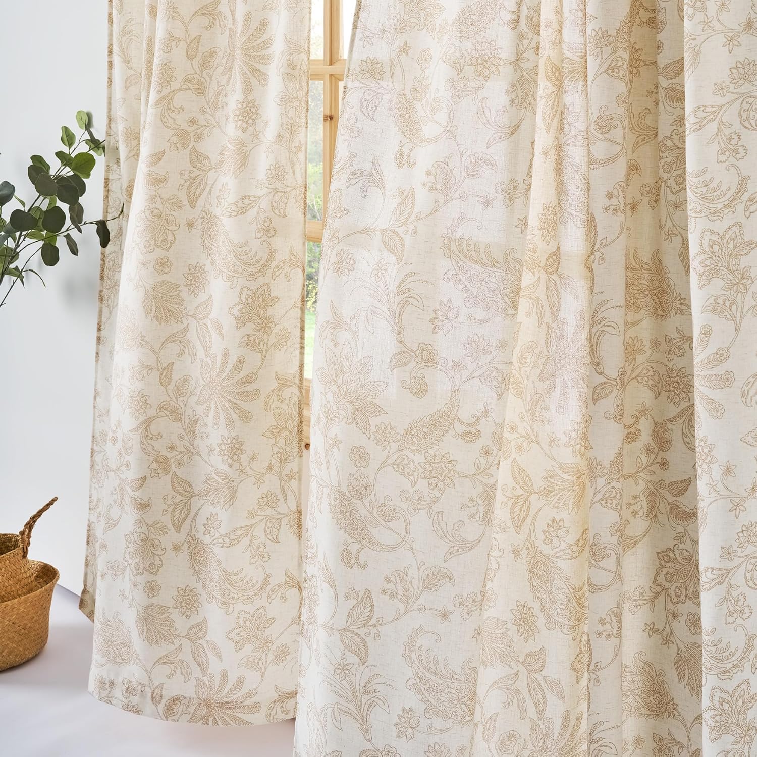 Natural beige light filtering linen curtains with intricate tan floral paisley pattern.