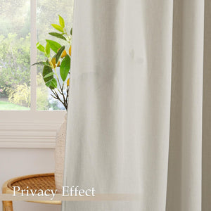 Natural beige linen curtain panel providing privacy, subtly obscuring a window with outdoor greenery.