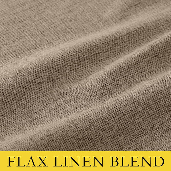 Close-up of a natural light brown fabric with a distinct woven texture and soft, undulating folds.