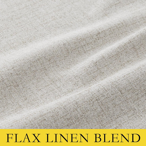 Close-up of textured natural off-white flax linen blend fabric with subtle woven flecks and soft folds.