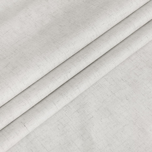 Natural light grey woven fabric displaying a slub texture with subtle dark flecks, gently folded.