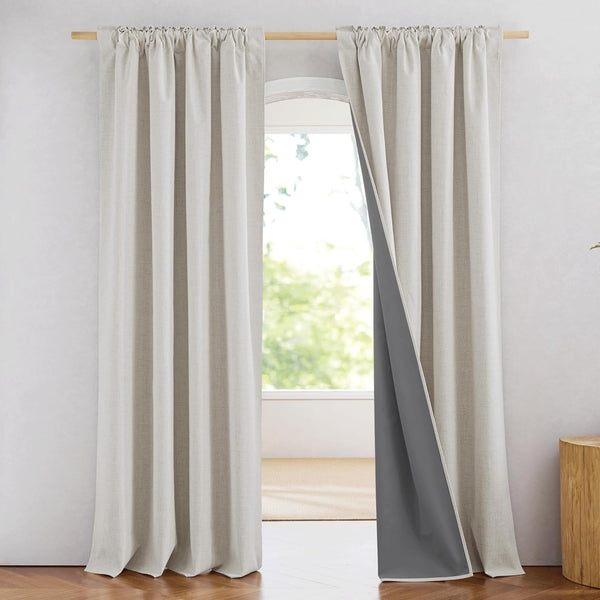 Natural linen blackout curtains with rod pocket top, revealing dark gray thermal lining.