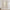 Pair of natural linen blend rod pocket curtains hanging on a wooden rod in a brightly lit room.