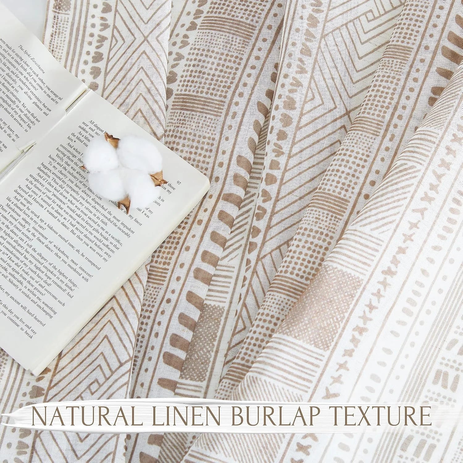 Natural linen burlap fabric with beige geometric pattern beside an open book