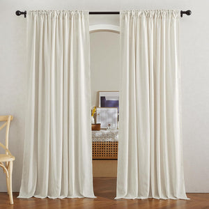 Natural linen light filtering off-white curtains with rod pocket top, hung on a black rod.