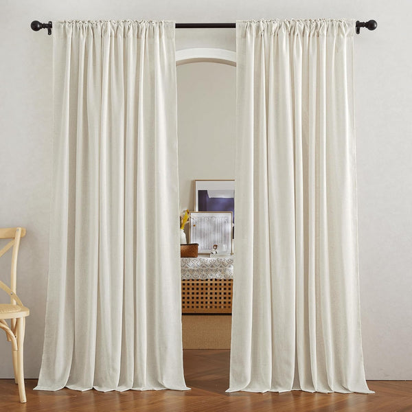 Natural linen light filtering off-white curtains with rod pocket top, hung on a black rod.