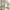 Natural linen light filtering curtain in light beige, casting soft sunlight shadows. Provides privacy.